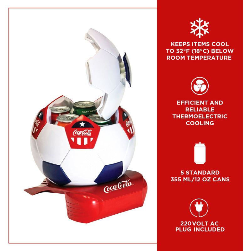 Product shot of Coca-Cola soccer ball shaped mini fridge on a white background, open and filled with 5 cans of Coke products. Text and icons to the right describe: Keeps items cool to 32F (18C) below room temperature; efficient and reliable thermoelectric cooling; 5 standard 355 mL/12 oz cans; 220 volt AC plug included