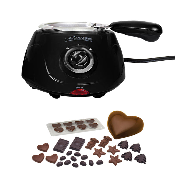 Product shot of electric chocolate melter and molded chocolates on white background