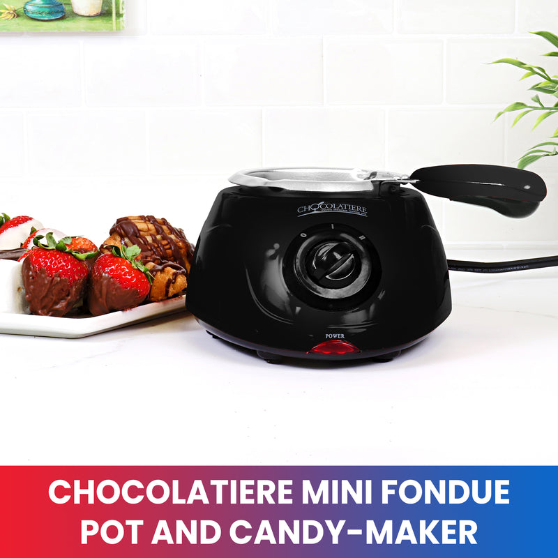 Lifestyle image of electric chocolate melter on a white counter with a plate of chocolate dipped strawberries and marshmallows to the left. Text below reads, "Chocolatiere mini fondue pot and candy-maker"