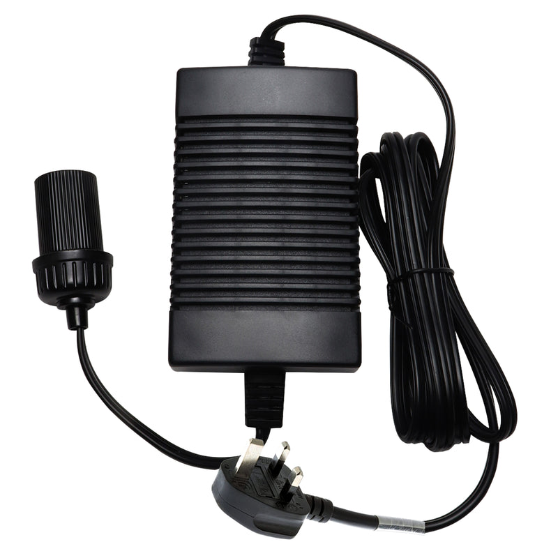 Product shot of AC to DC power adapter viewed from above on a white background